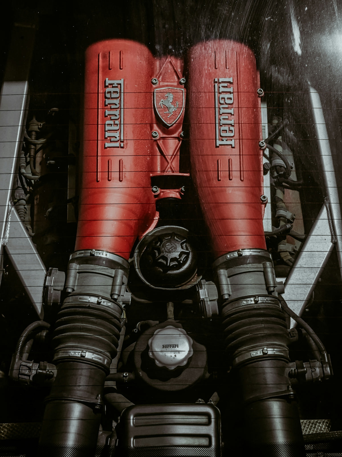 a pair of red boxing gloves sitting on top of a motorcycle